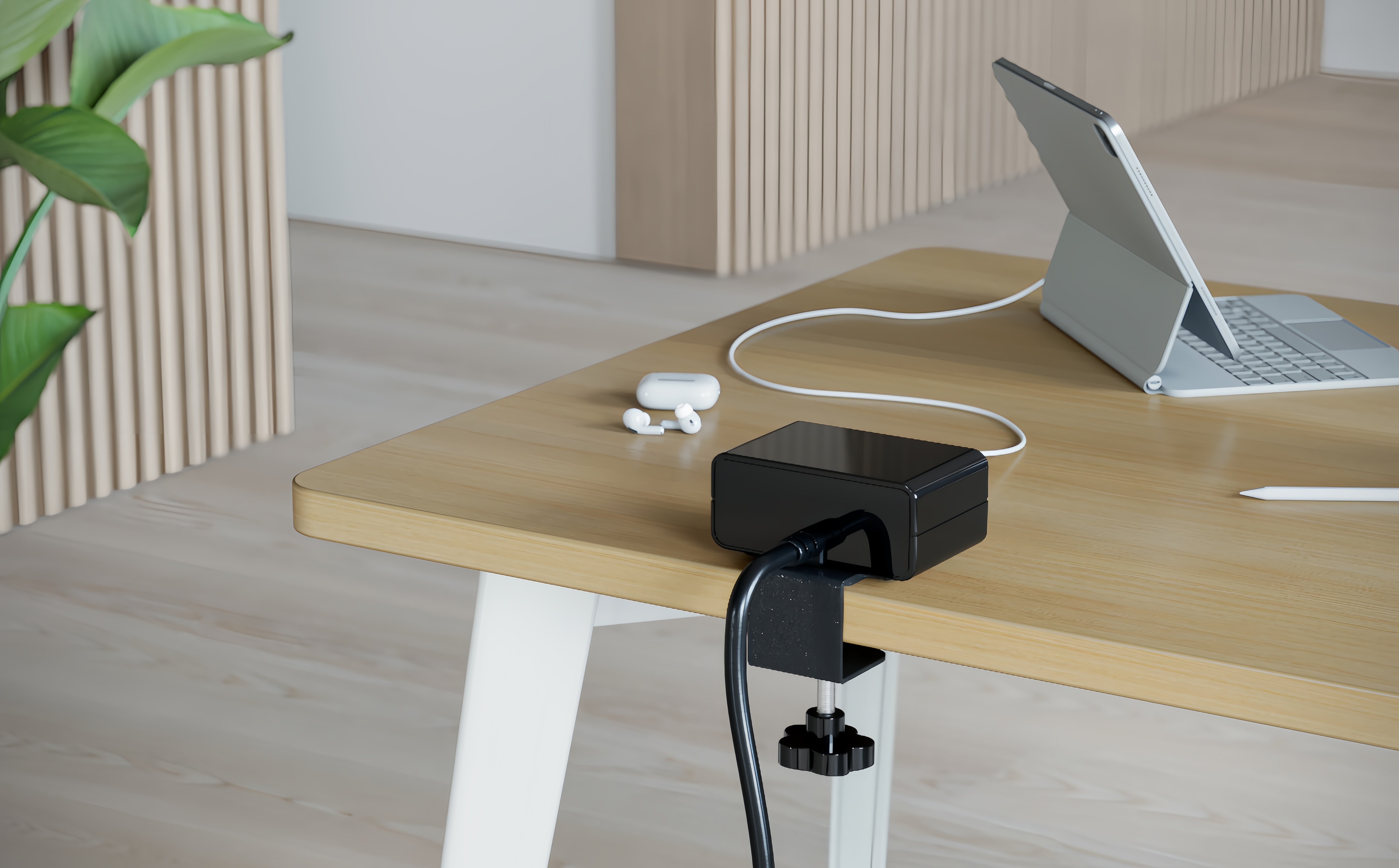 Clamp-on desktop power module with USB-C PD 65W attached to desk edge