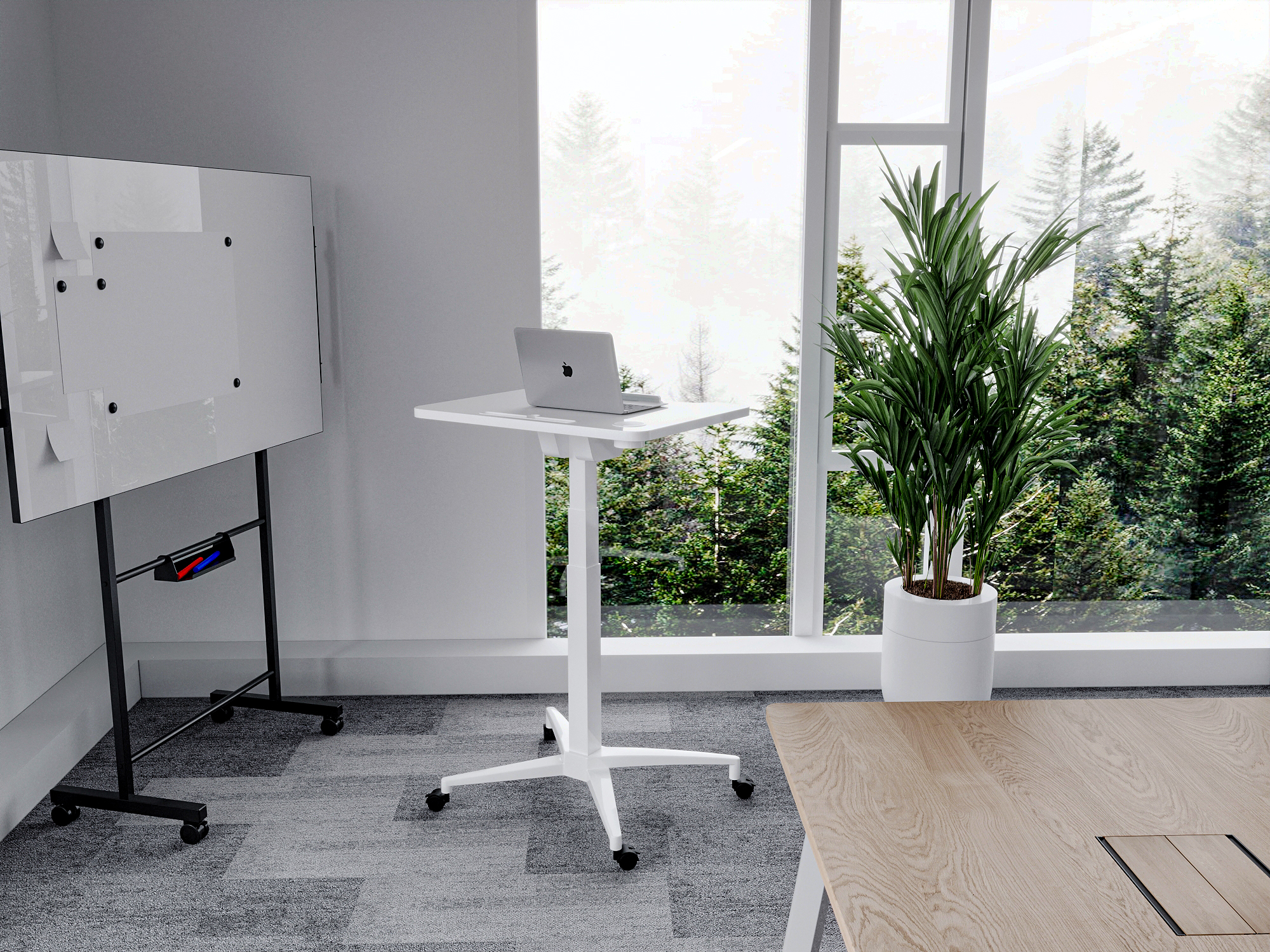 SpaceNest Table in collaborative meeting room with flip top nested and pneumatic height adjustment in use